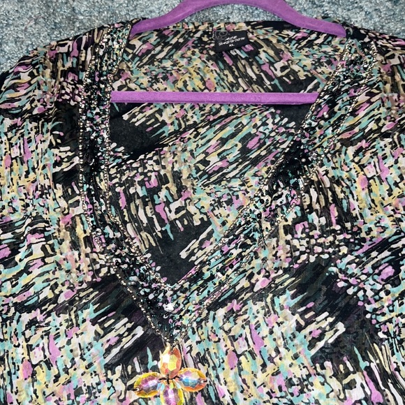 A thin sheer dressy top or even a coverup for summer time! - Picture 2 of 4